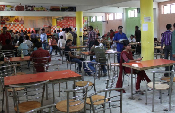 a large room with tables and chairs